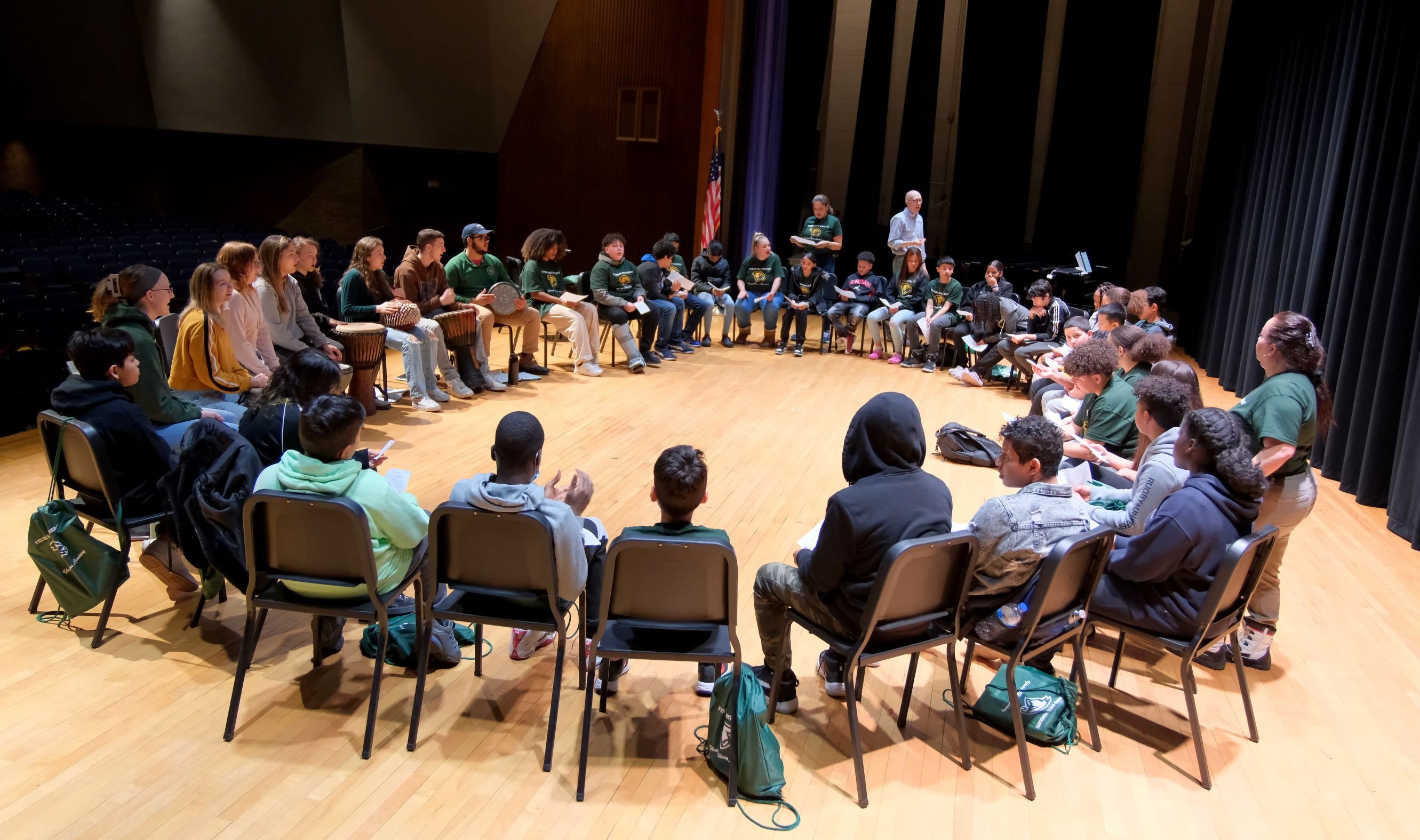 Young Falcons Academy Week Alma Mater in Weston Auditorium with