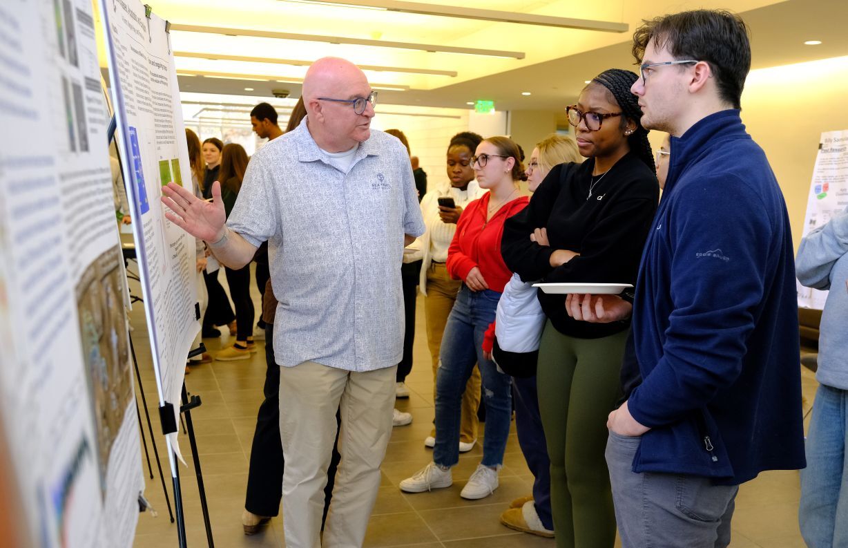 S.T.E.M. Week - Faculty Research Symposium - Professors, Posters, & Pizza