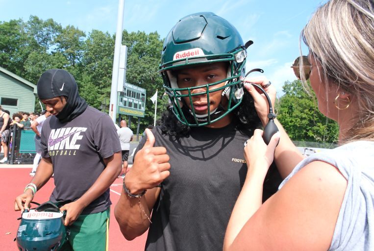 Football Team Gets Fitted